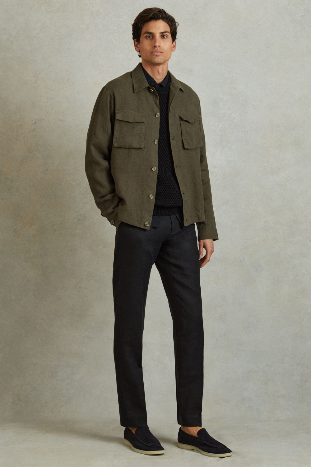 Men's green and black outfit combination