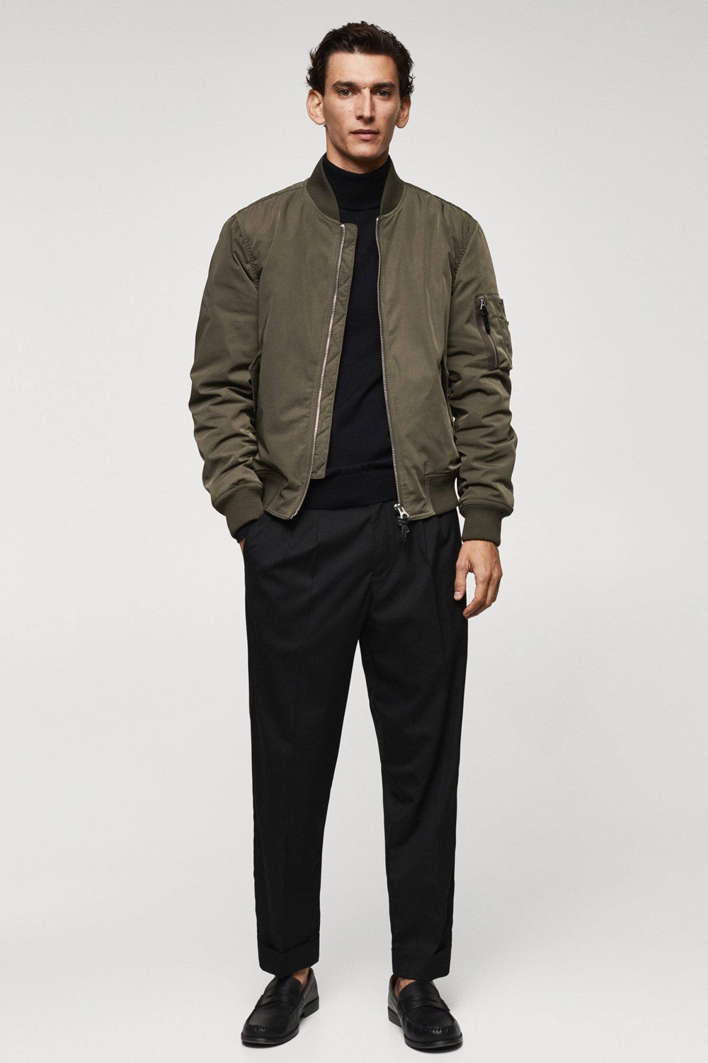 Men's green and black outfit combination