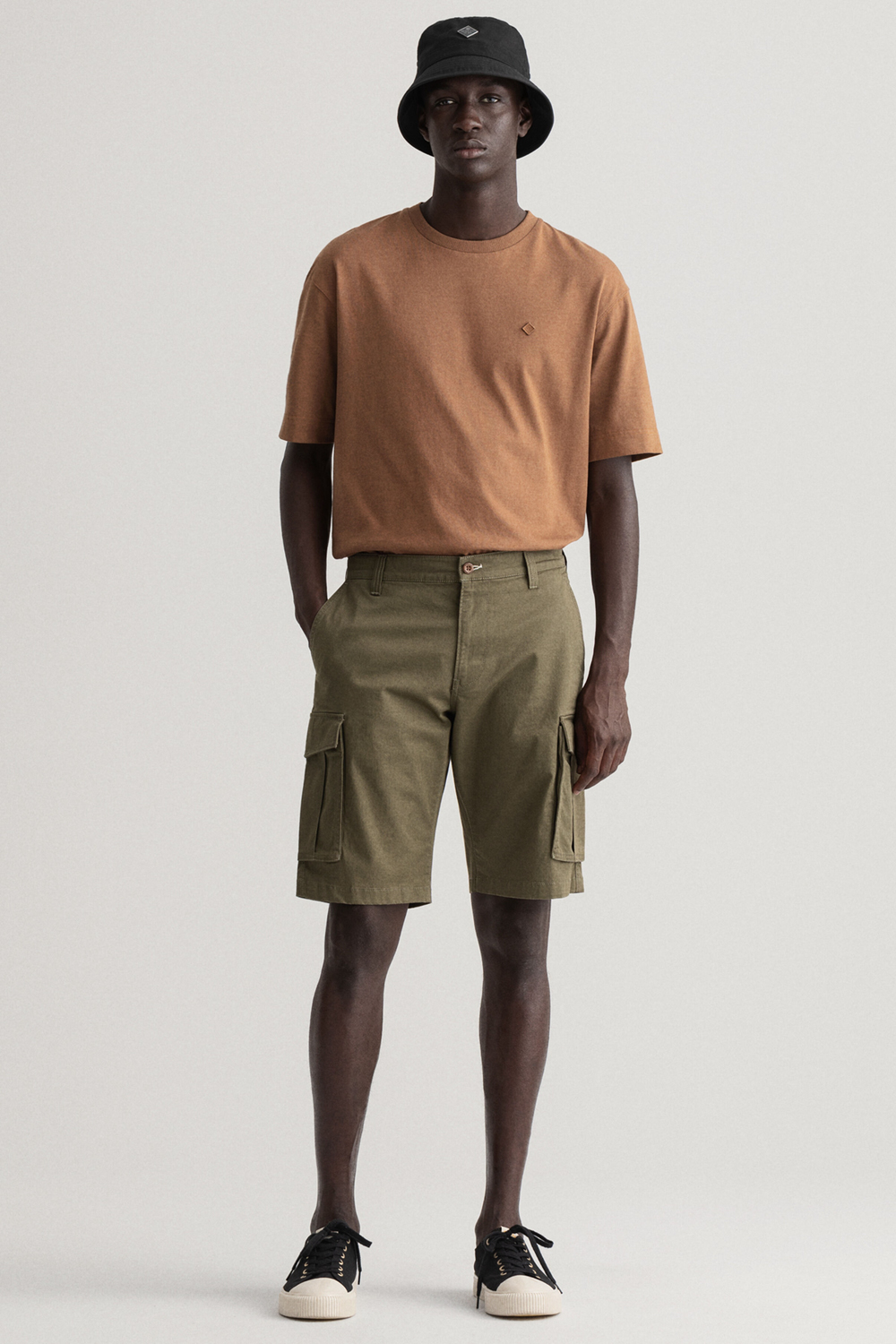 Men's brown and green outfit combination